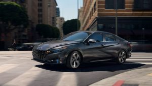 A charcoal 2022 Hyundai Elantra being driven on the road. | Hyundai dealer in Little Rock, AR