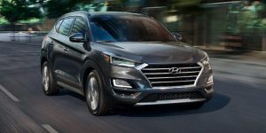 A gray 2020 Hyundai Tucson being driven on the road. | Hyundai service in Little Rock, AR.