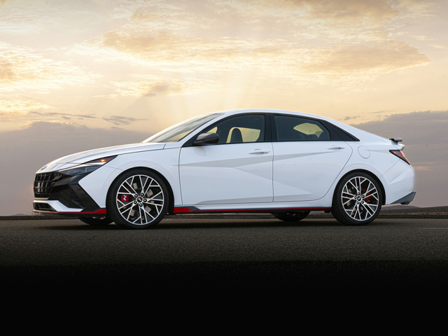 Profile view of a white 2023 Hyundai Elantra. | Hyundai dealer in Little Rock, AR | Crain Hyundai of Little Rock