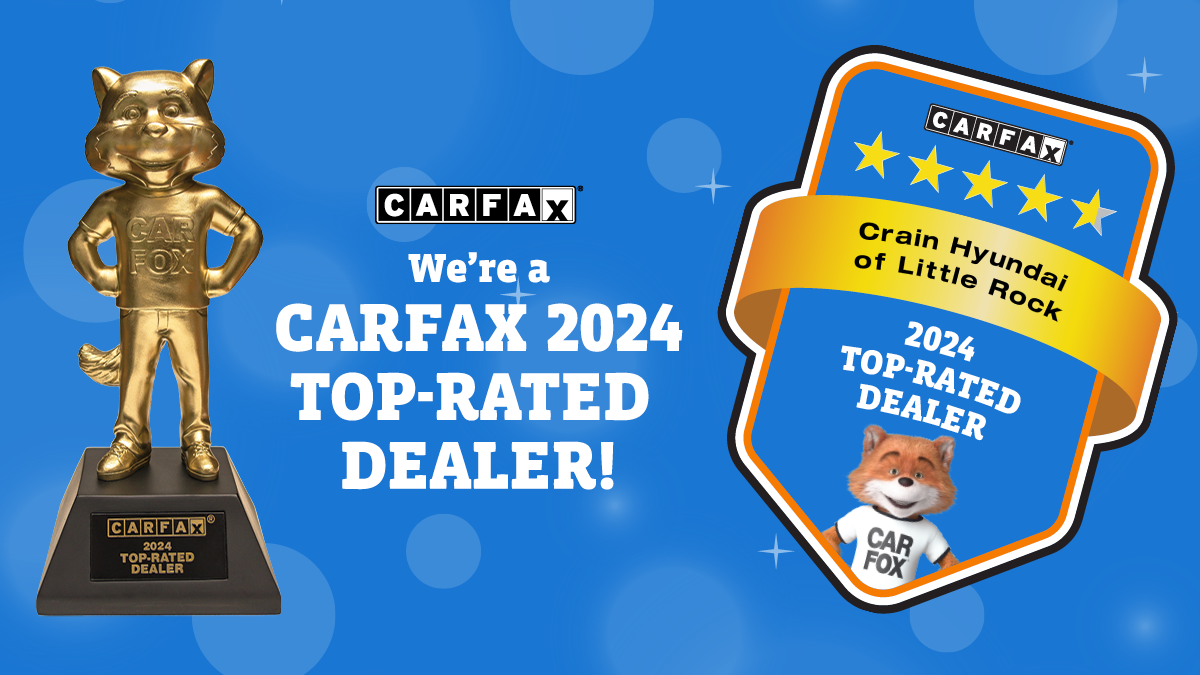 Carfax graphic celebrating Crain Hyundai of Little Rock as a 2024 Top-Rated Dealer, featuring the Car Fox trophy and five-star badge on a blue background.