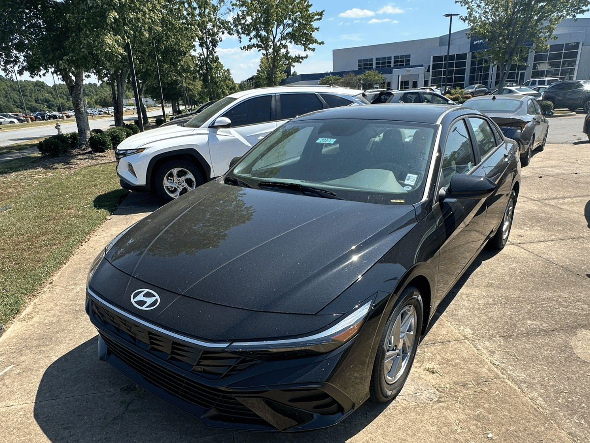 Black 2025 Hyundai Elantra parked outside Crain Hyundai of Little Rock dealership